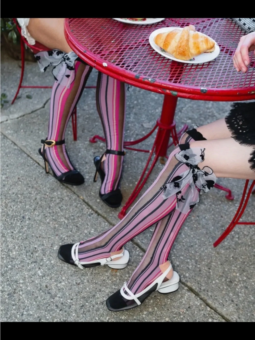 Sock Candy Parision Pink Striped Knee-High Socks with Floral Bow Accent.